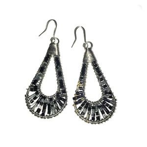 Silver and black beaded earrings.